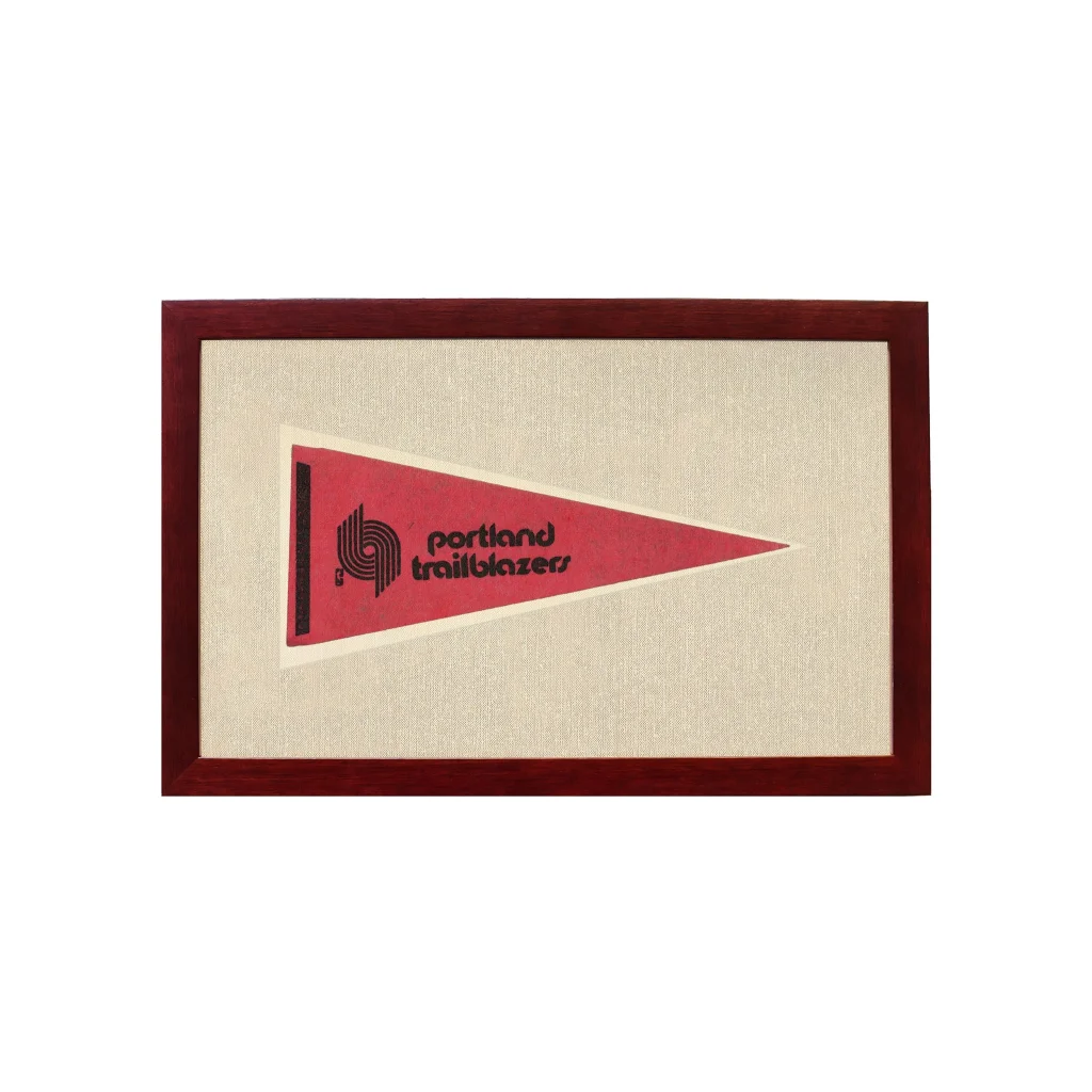 Vintage Portland Trail Blazers pennant in red with black logo, framed