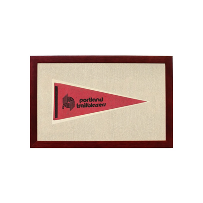 Vintage Portland Trail Blazers pennant in red with black logo, framed