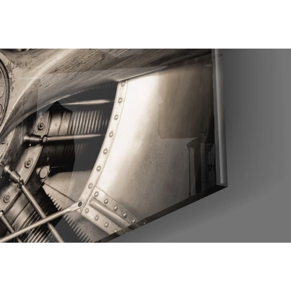Vintage silver airplane engine with rivets, gears, as wall art