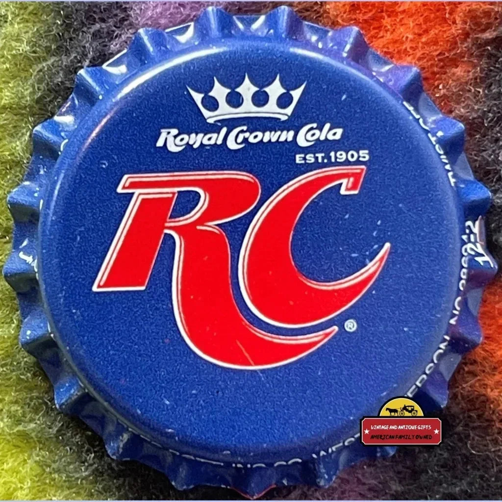 Blue bottle cap featuring RC logo and Royal Crown Cola EST 1905 from a rare 90s collection