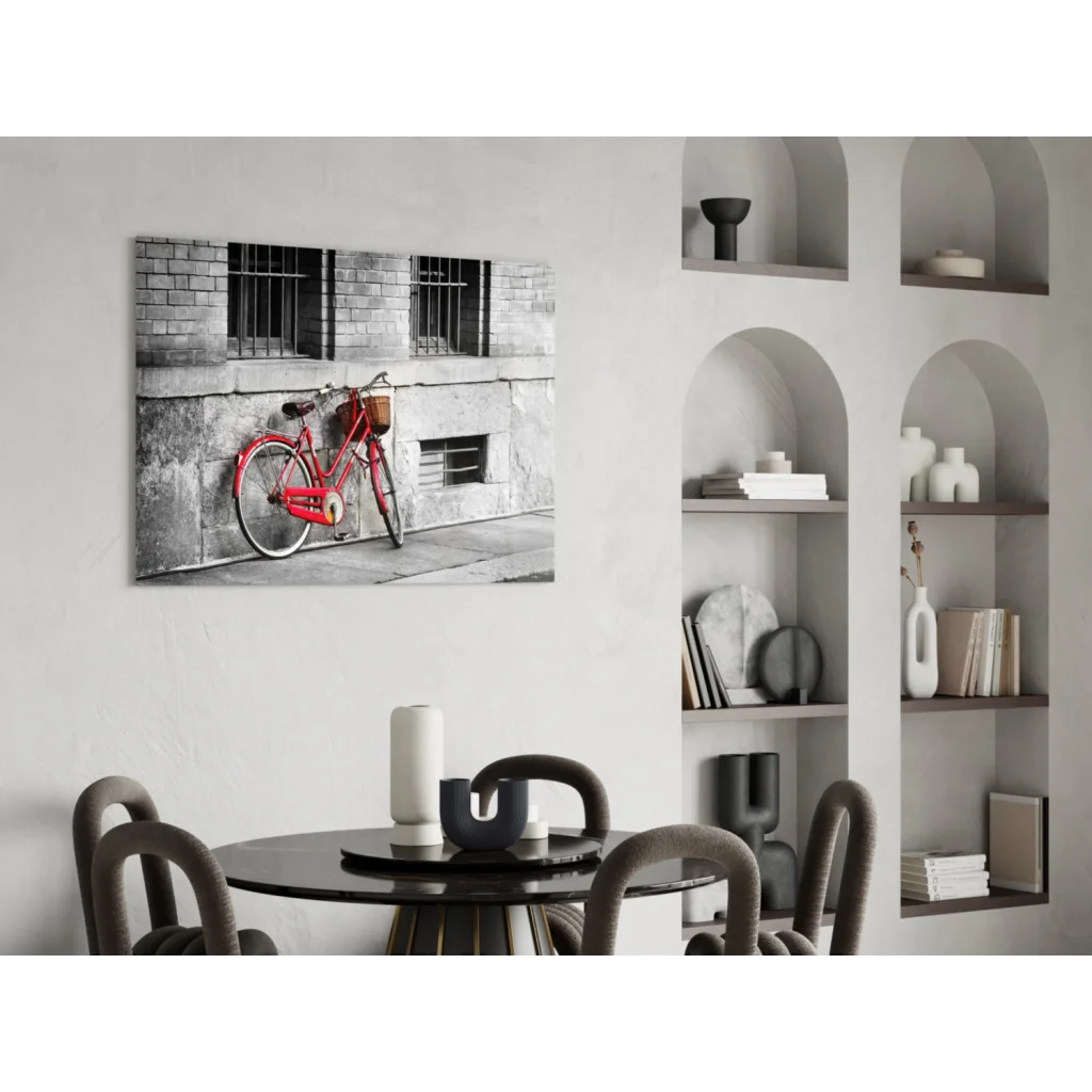 Vintage red bicycle metal wall art with basket on black and white background