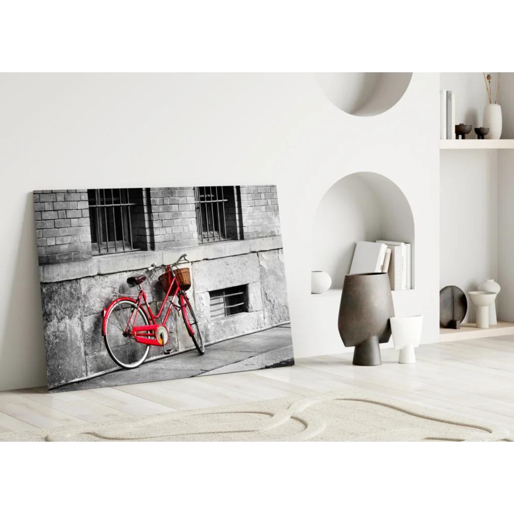 Vintage red bicycle metal wall art with basket on black and white background