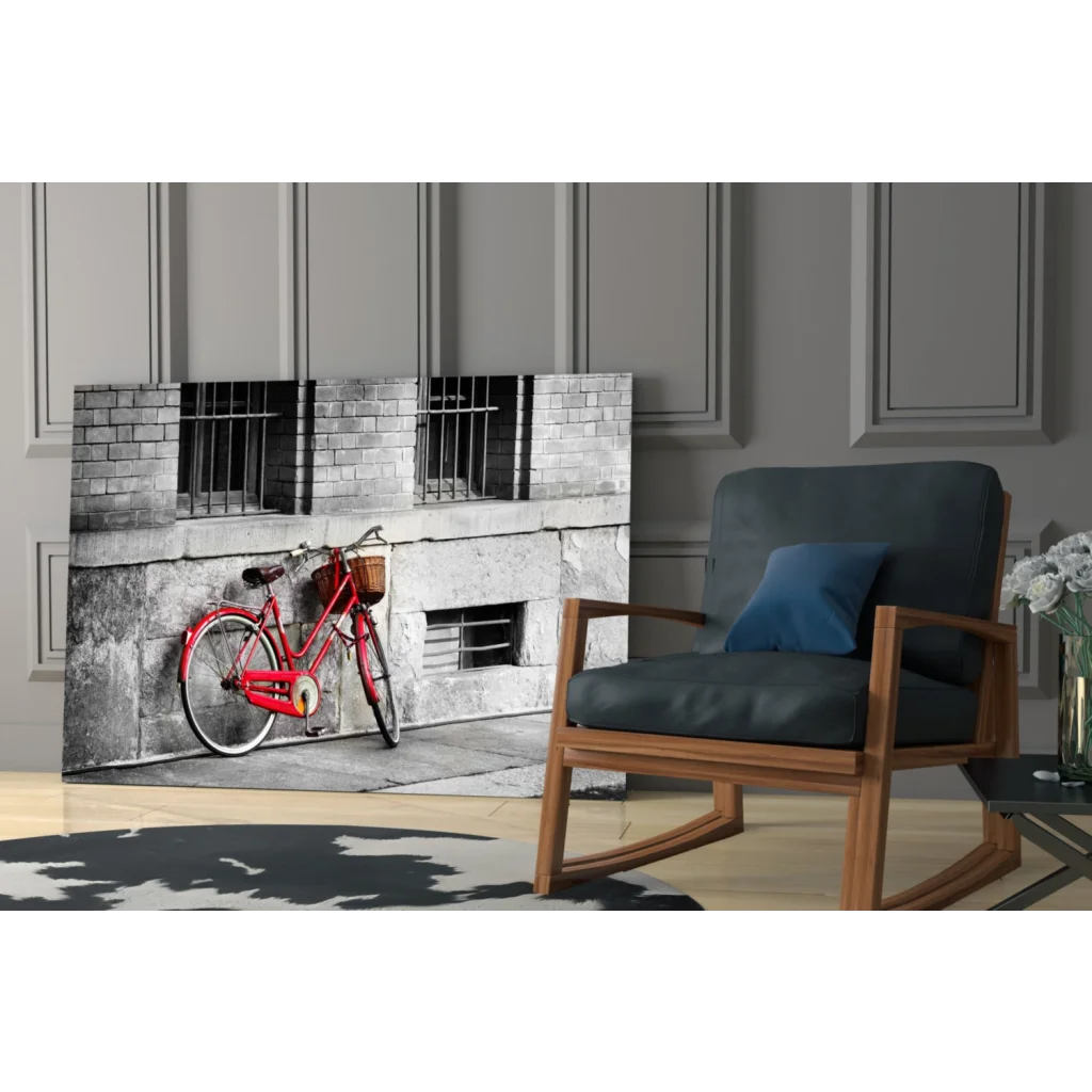 Vintage red bicycle metal wall art with basket on black and white background