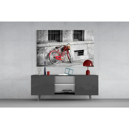 Vintage red bicycle wall art with basket design on gray sideboard