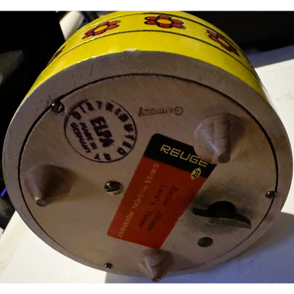 Vintage Reuge music box with Swiss clock components featuring a German soldier figure