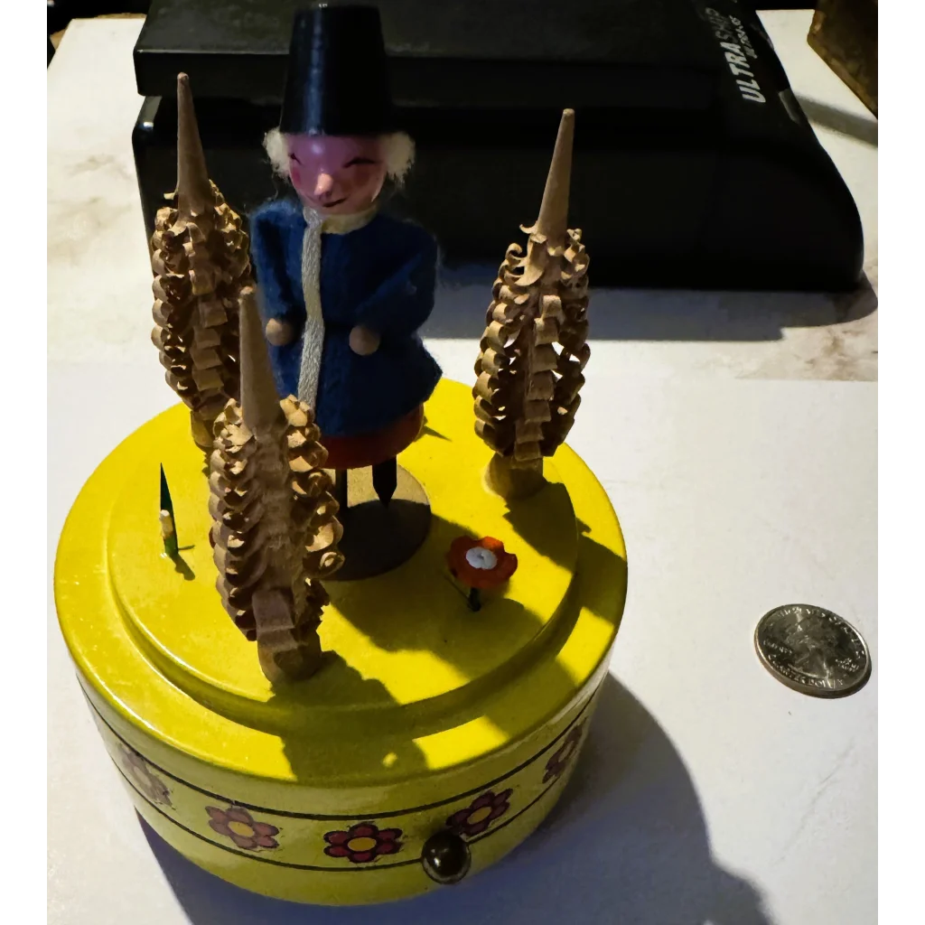 Vintage Reuge music box with German soldier figure showcasing Swiss clock components