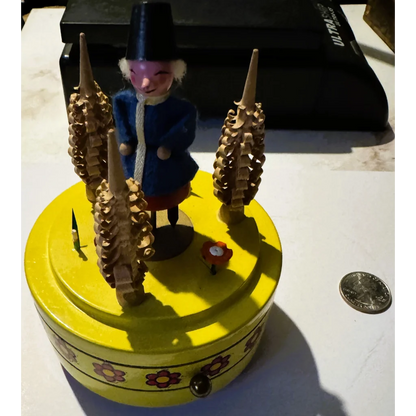 Vintage Reuge music box with German soldier figure showcasing Swiss clock components