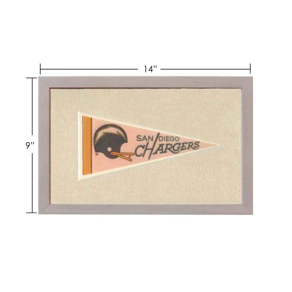 Vintage San Diego Chargers pennant in gray frame on pink background
