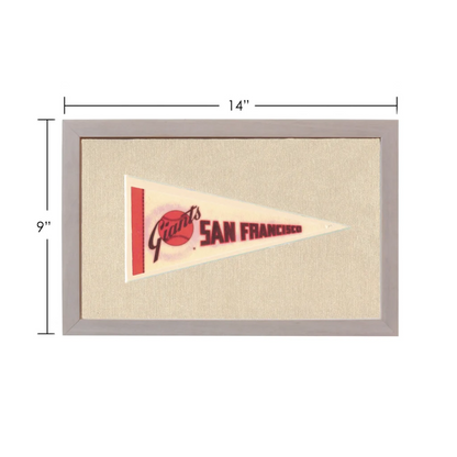 Vintage San Francisco Giants pennant in gray frame with red and black lettering on cream background