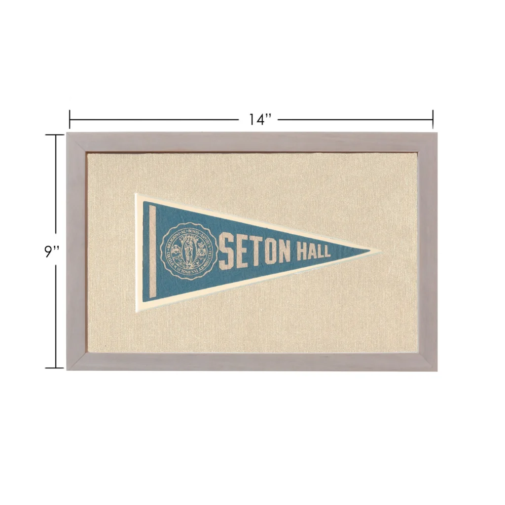 Vintage Seton Hall pennant in teal and cream with emblem