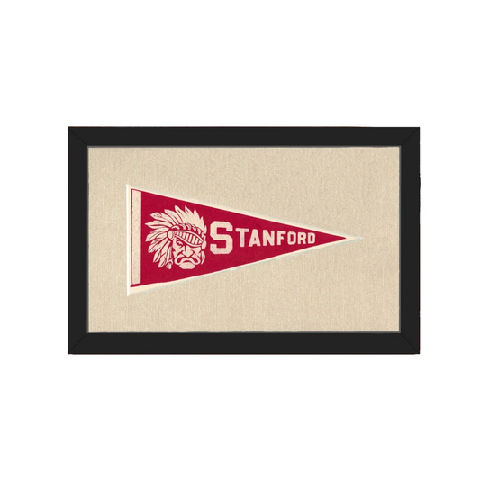 Vintage Stanford University pennant with red base, white Native American chief design, and bold lettering in black frame