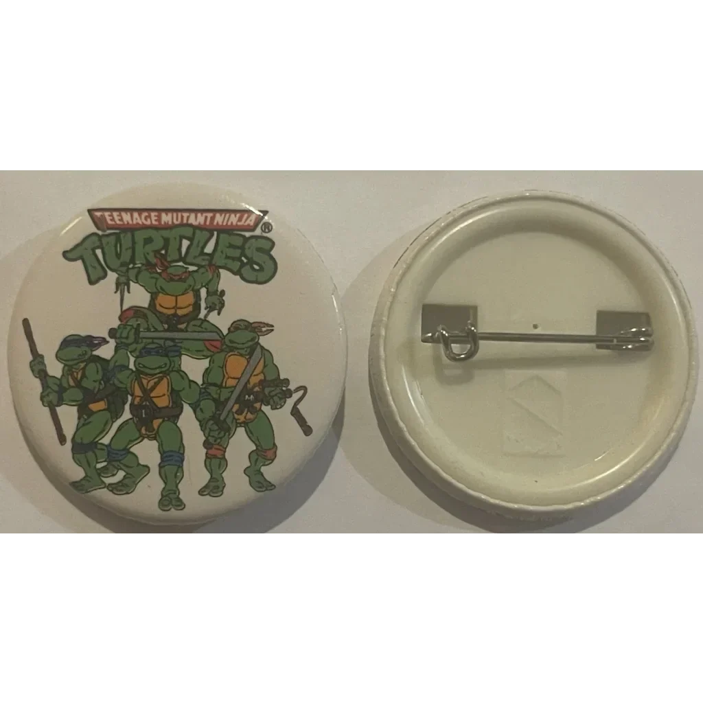 Circular pin badge showcasing Teenage Mutant Ninja Turtles characters, a cool collectible