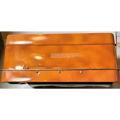 Vintage Three Stooges lunch box with orange leather, metal accents, and sturdy handle