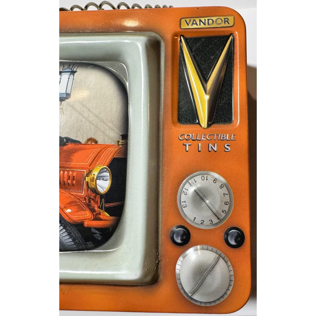 Orange vintage TV tin with silver dial and yellow V logo from Three Stooges lunch box