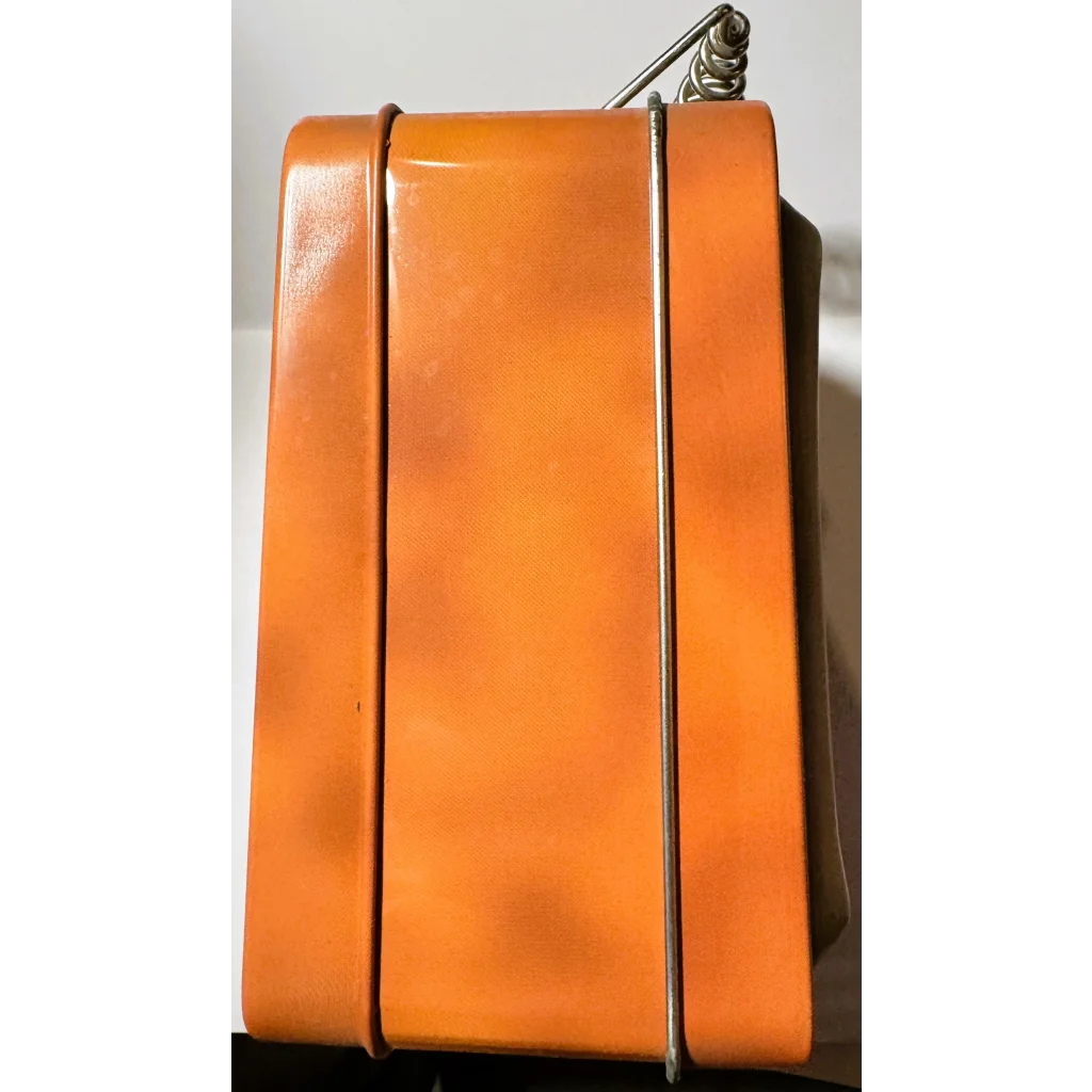 Orange leather accordion-style wallet with silver hardware from Vintage Three Stooges lunch box