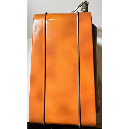 Orange leather accordion-style wallet with silver hardware from Vintage Three Stooges lunch box