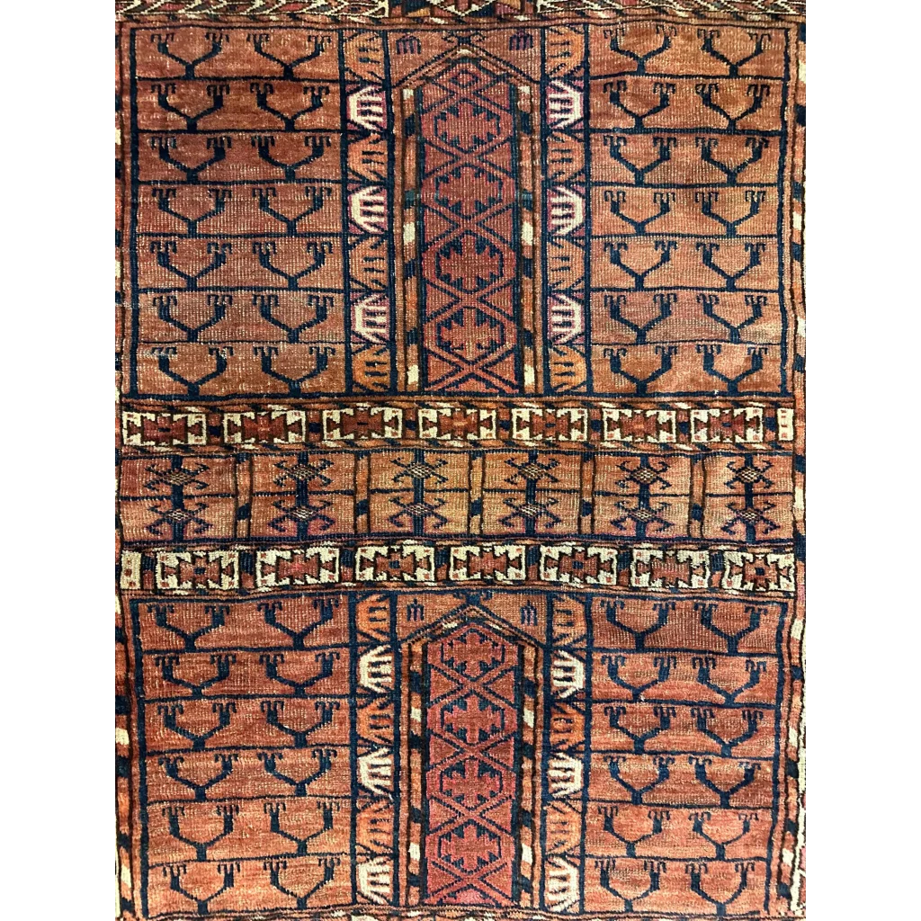 Vintage Turkmen geometric rug in rust navy cream wool