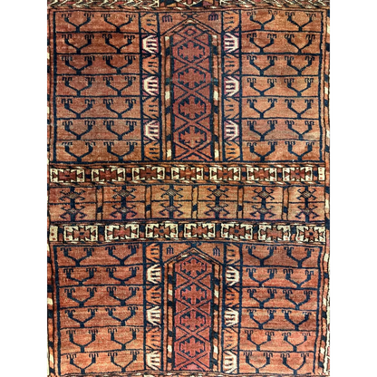 Vintage Turkmen geometric rug in rust navy cream wool