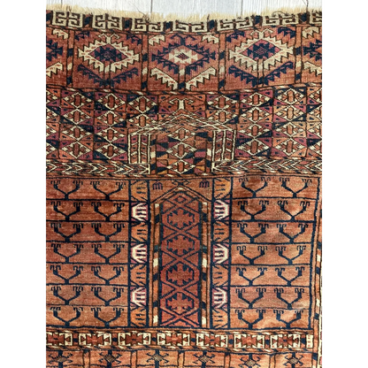 Vintage Turkmen geometric rug in rich earthy tones