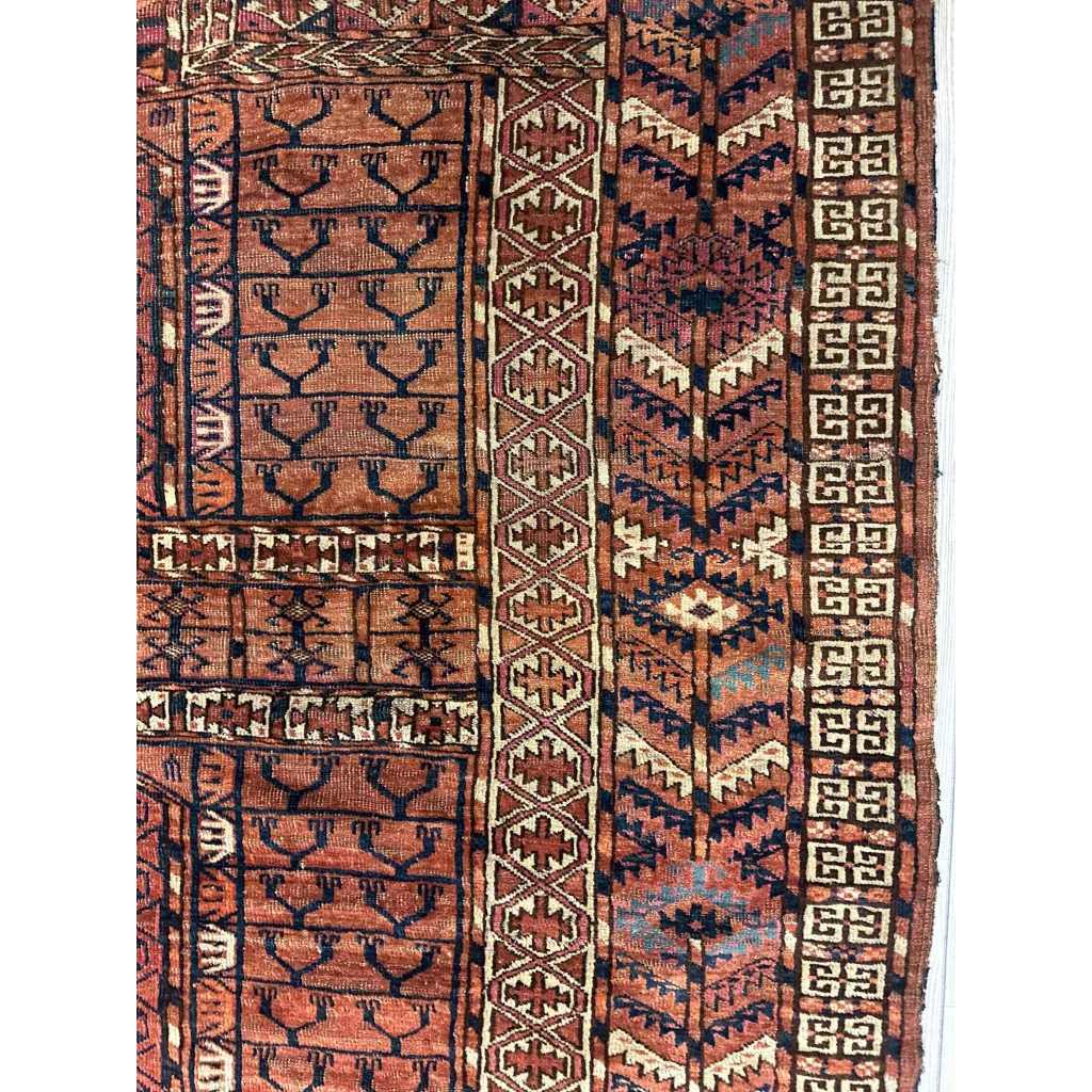 Antique late 19th century Turkmen Ensi rug detail showing geometric tribal patterns