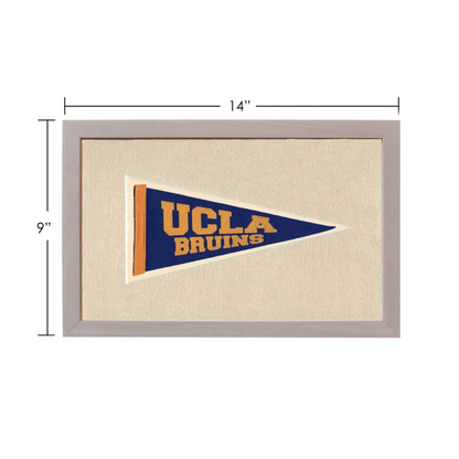 Vintage UCLA pennant framed with navy blue field and gold trim