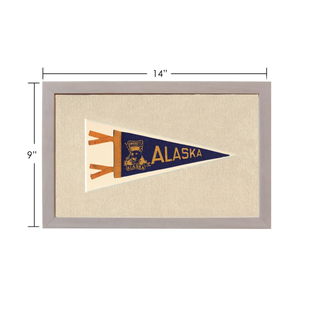Vintage University of Alaska pennant in navy blue and cream, gray frame