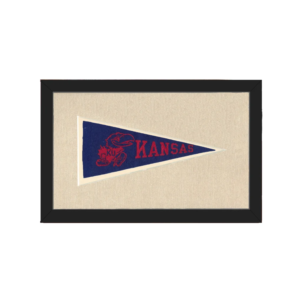 Vintage University of Kansas pennant in navy blue frame with red lettering