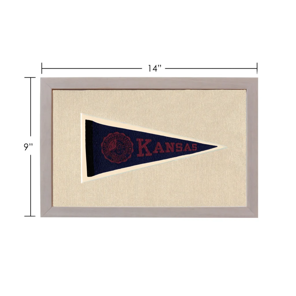 Framed vintage University of Kansas pennant in navy blue with red lettering