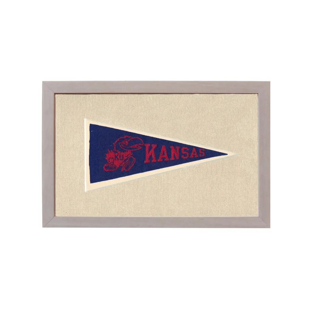 Vintage University of Kansas pennant with red jayhawk and Kansas lettering