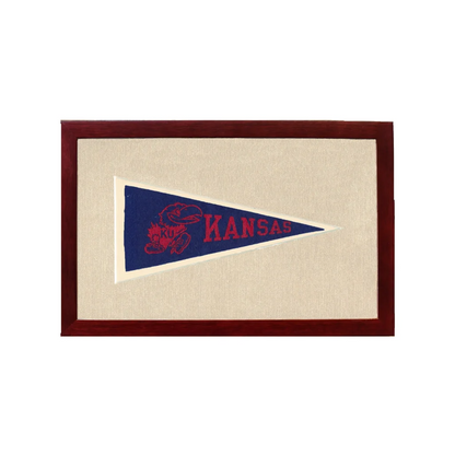 Vintage University of Kansas pennant in navy blue with red Jayhawk logo