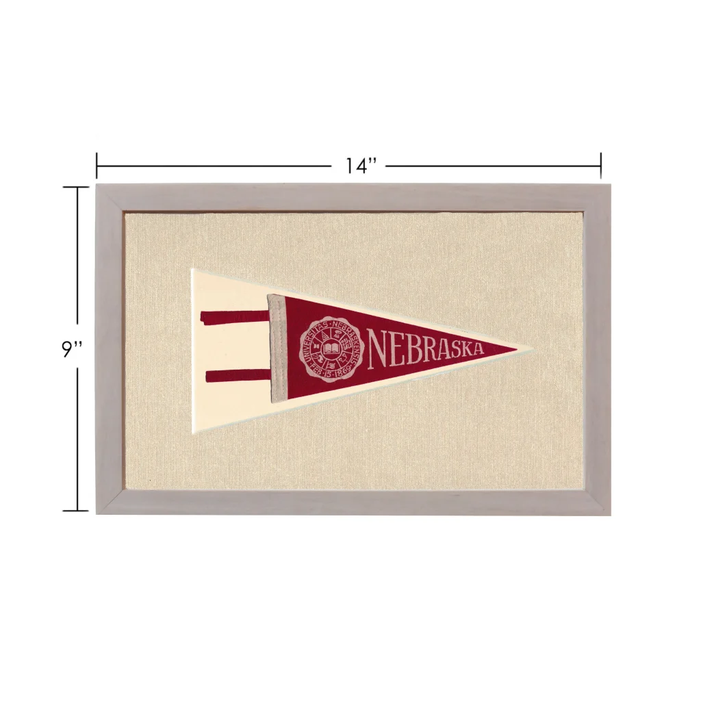 Vintage University of Nebraska pennant in maroon and cream