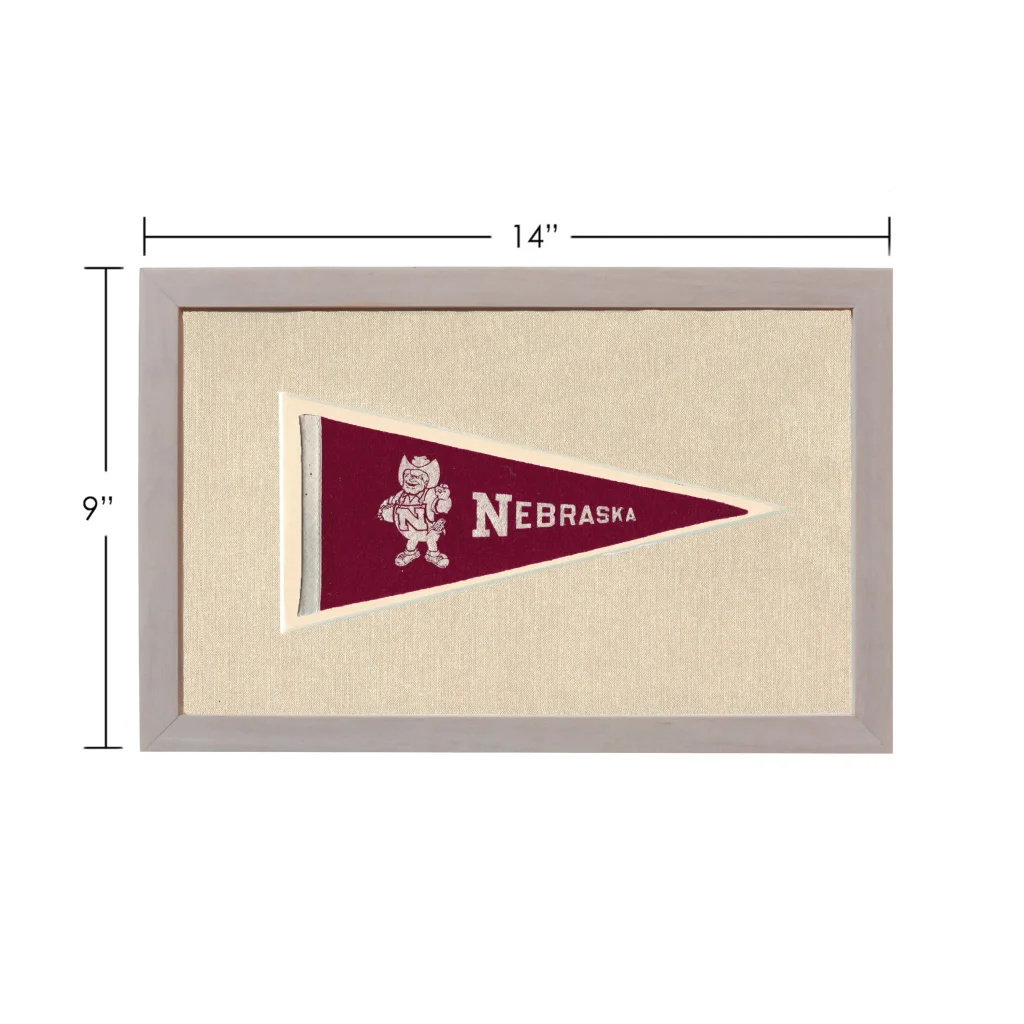 Vintage University of Nebraska pennant in maroon with white embroidered mascot