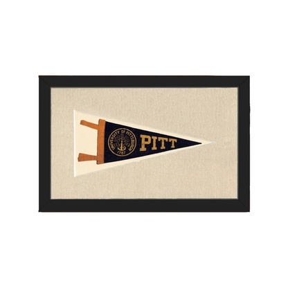 Vintage University of Pittsburgh pennant in navy blue and cream with gold Pitt lettering and seal, black framed