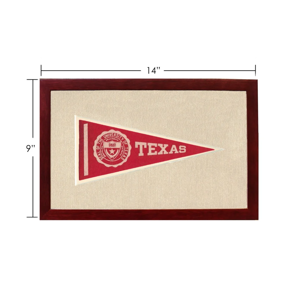 Vintage University of Texas pennant in red and cream, framed in dark wood