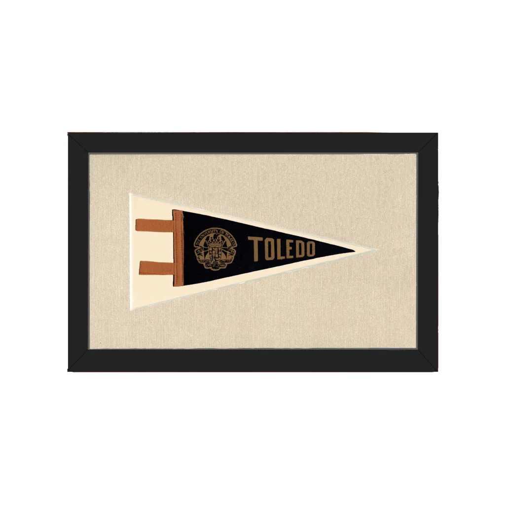 Framed vintage University of Toledo pennant in black, cream, gold