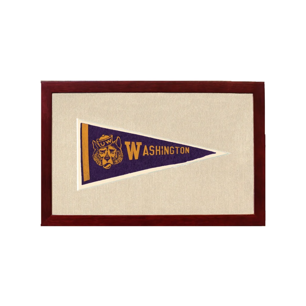 Vintage University of Washington Huskies pennant in dark wood frame