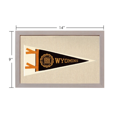Vintage University of Wyoming pennant in black, cream, gold lettering