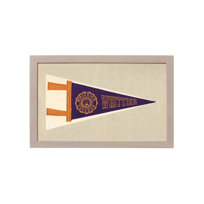 Vintage Whittier College pennant framed with navy blue field and gold logo