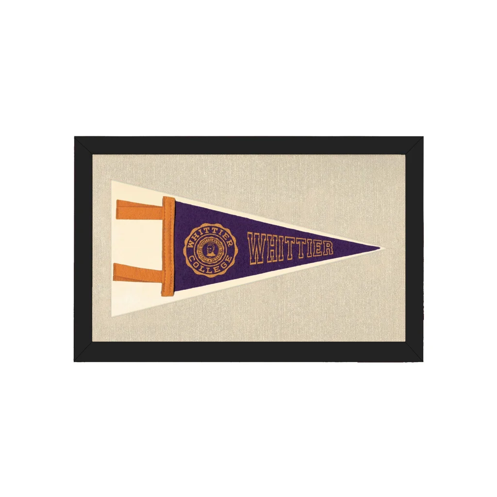 Vintage Whittier College pennant framed on beige, purple cream gold logo