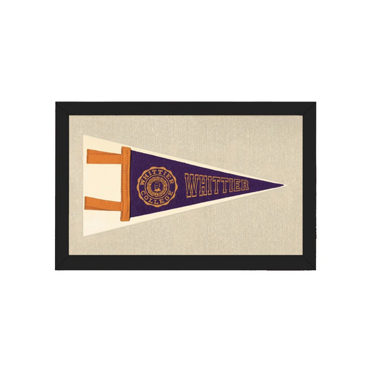 Vintage Whittier College pennant framed on beige, purple cream gold logo