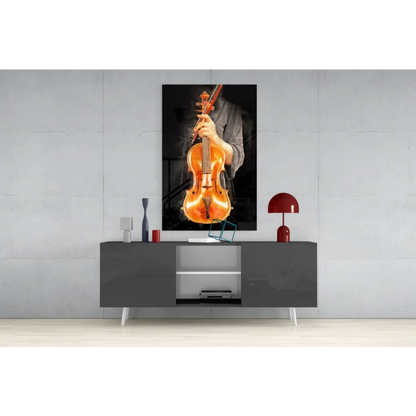 Vibrant orange violin glass wall art on minimalist gray wall above console table