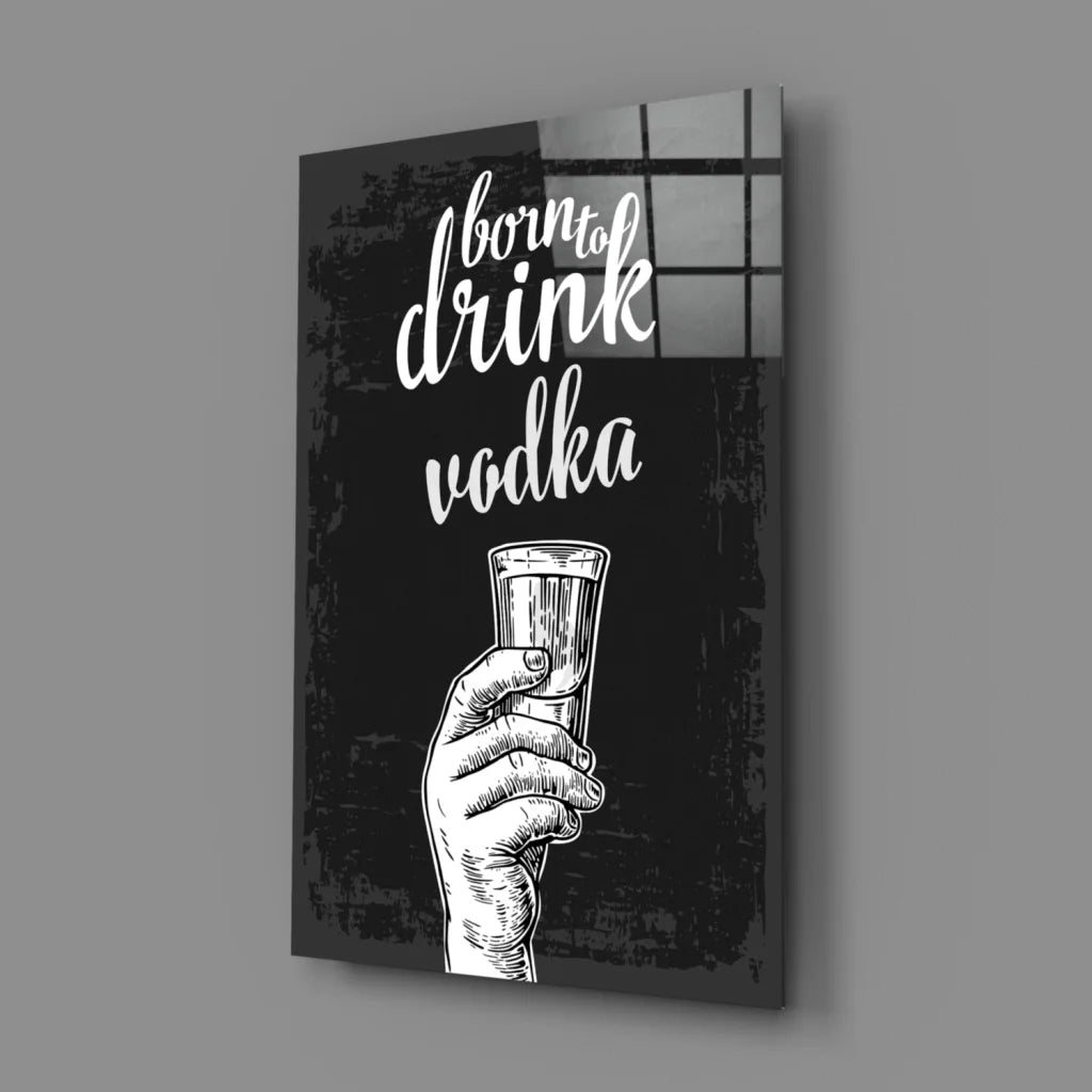 Black and white illustrated glass wall art canvas print of hand holding shot glass with Born to Drink Vodka text