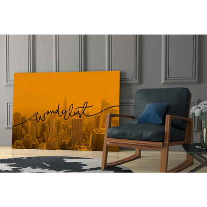 Vibrant orange glass wall art with city skyline and wanderlust script
