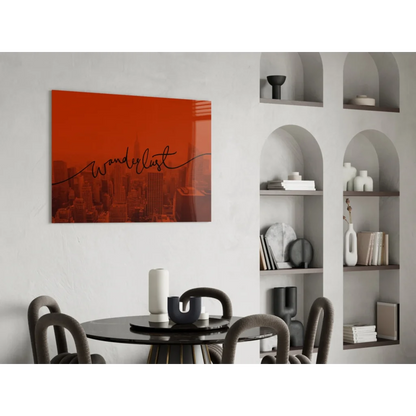 Vibrant orange wanderlust wall art in cursive script