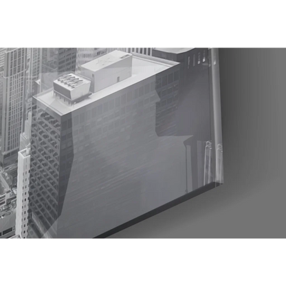 Sleek glass wall art of grayscale cityscape skyscrapers in acrylic frame
