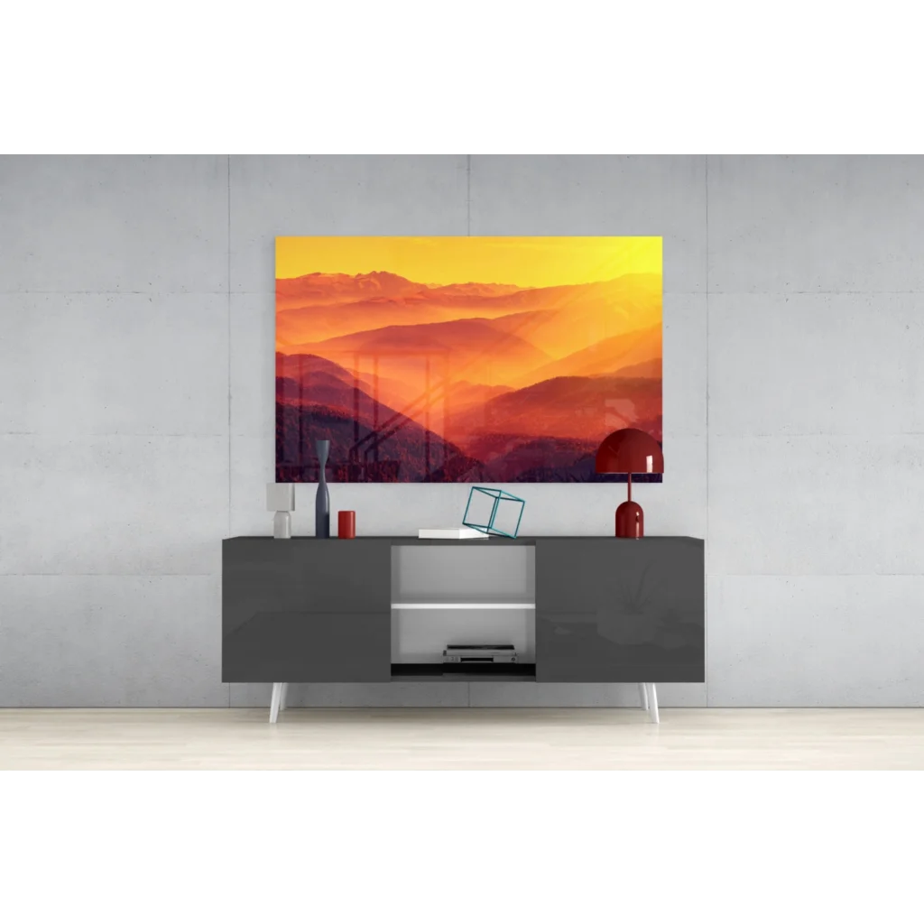 Fiery Mountain Sunset glass wall art over gray console