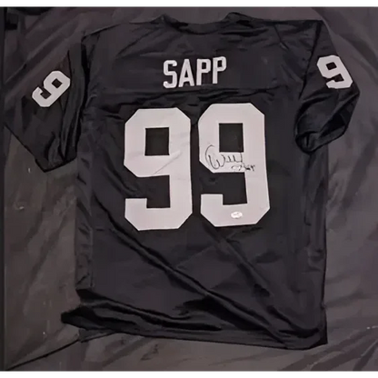 Signed Warren Sapp black football jersey with 99 and FiveStar Grading COA authenticity