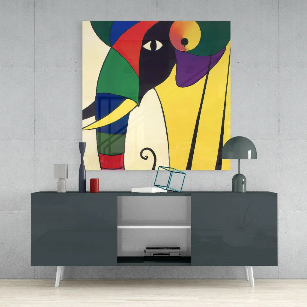 Vibrant geometric glass wall art with bold black, red, yellow face
