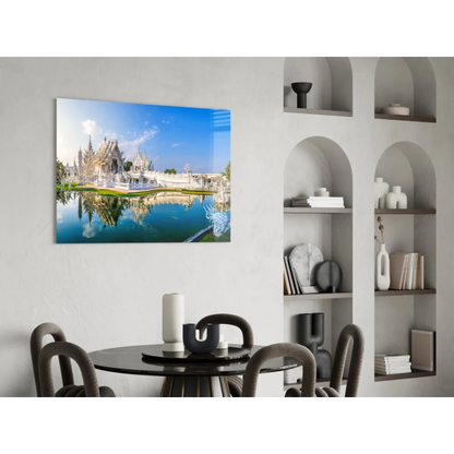 Stunning glass wall art of white temple reflected in blue water