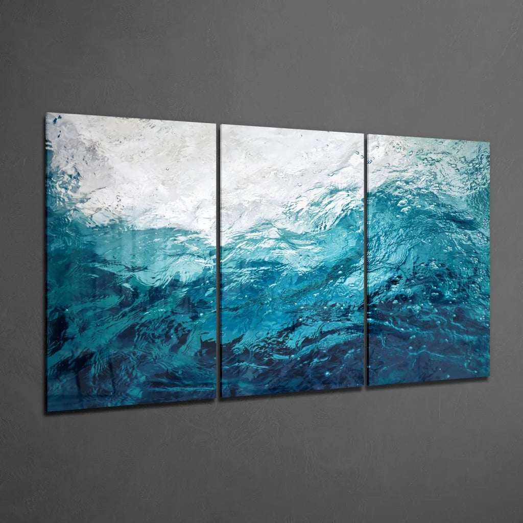Vibrant turquoise wave insigne glass art triptych in three panels